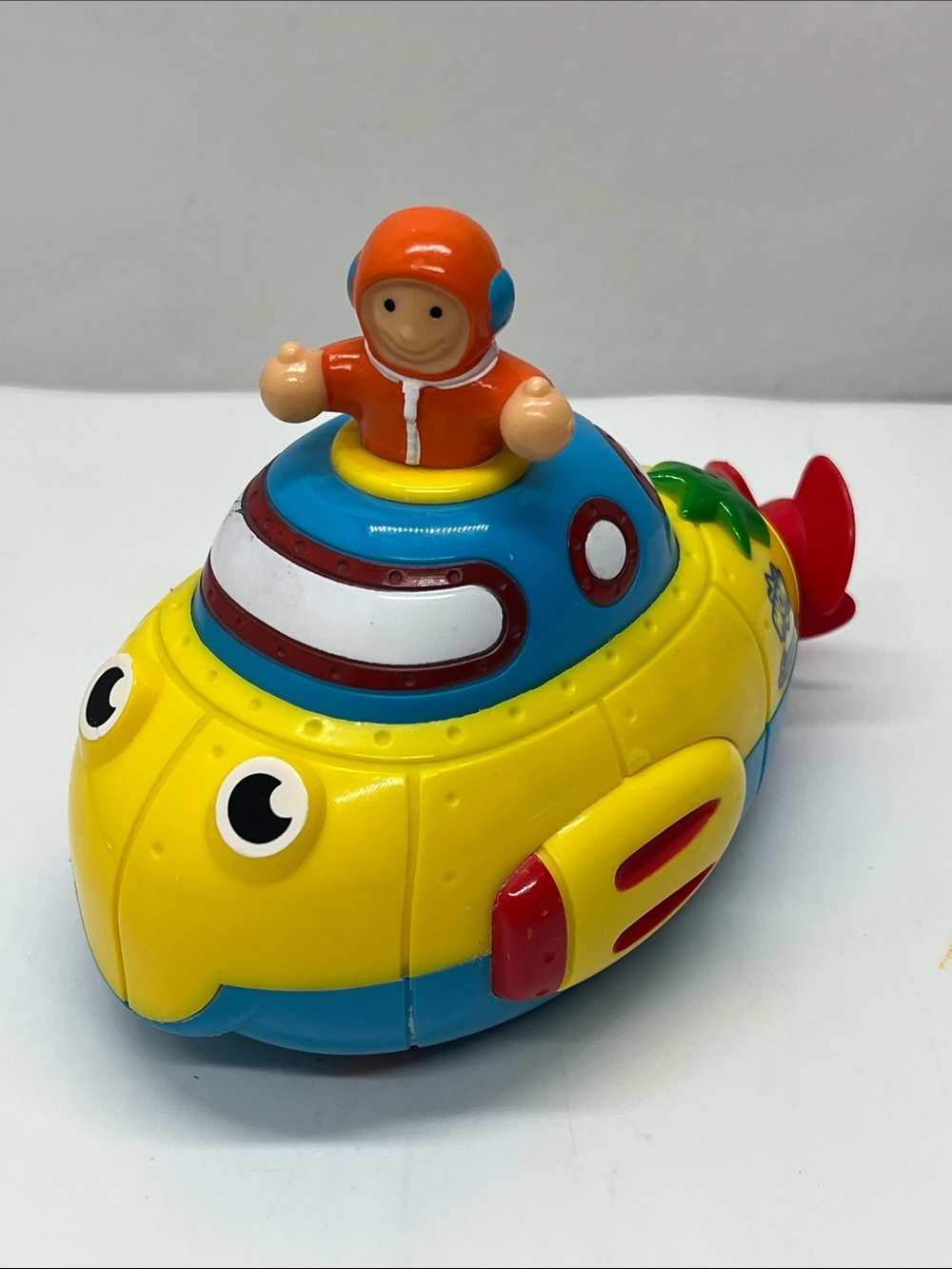 Wow Sunny Yellow and Blue Submarine Bath Toy with Orange Captain